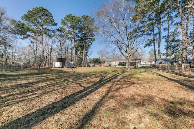 view of yard with fence