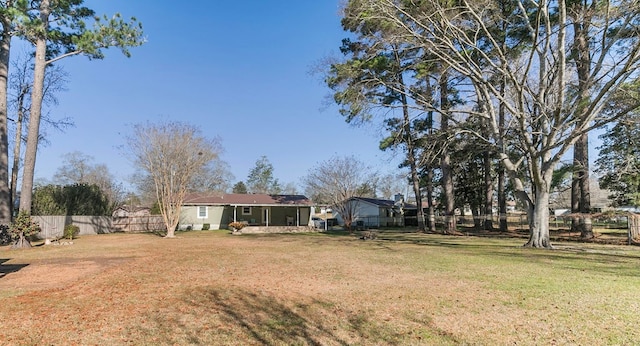 view of yard featuring fence