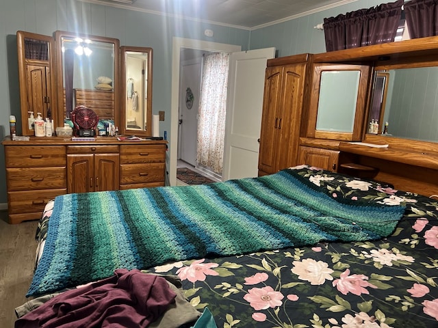 bedroom with ornamental molding