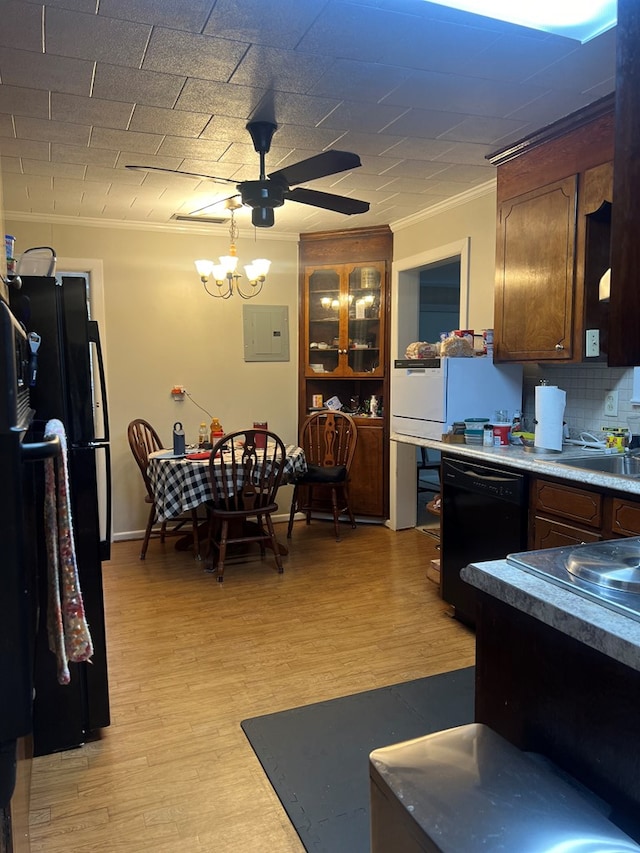 kitchen with black appliances, backsplash, crown molding, and light hardwood / wood-style flooring