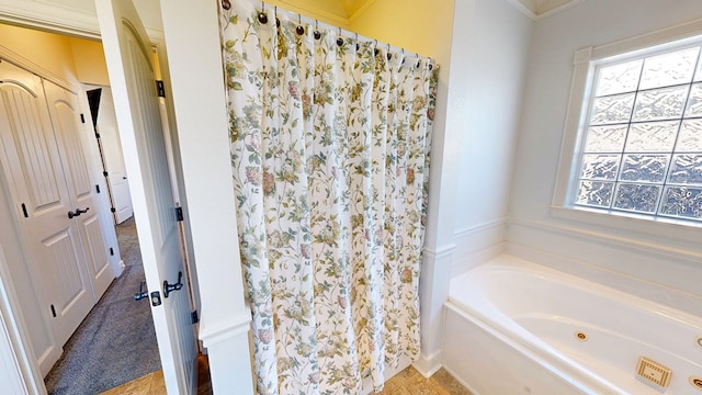 full bathroom with a garden tub and a shower with shower curtain