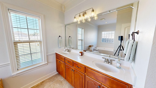 bathroom with double vanity, a garden tub, a sink, and crown molding