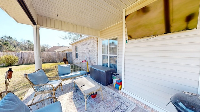 view of patio with fence