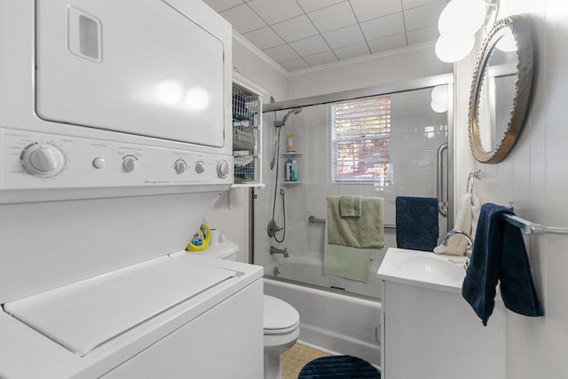 668 Lake Front Dr, Abbeville, AL 36310 - full bath featuring estacked washer and dryer, crown molding, bath / shower combo with glass door, and vanity