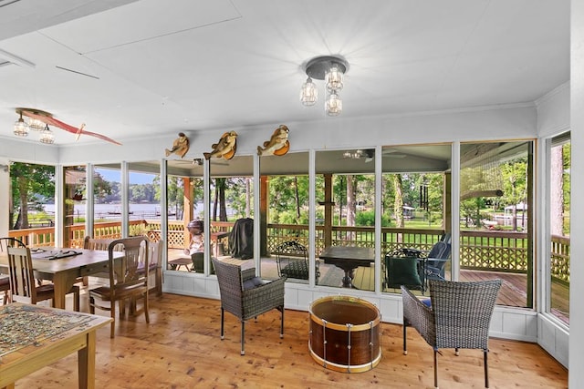 668 Lake Front Dr, Abbeville, AL 36310 - sunroom / solarium with a chandelier and a fire pit