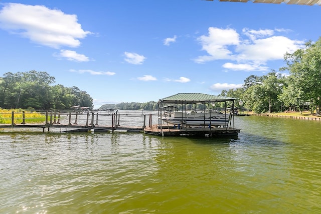 668 Lake Front Dr, Abbeville, AL 36310 - dock area with boat lift and a water view