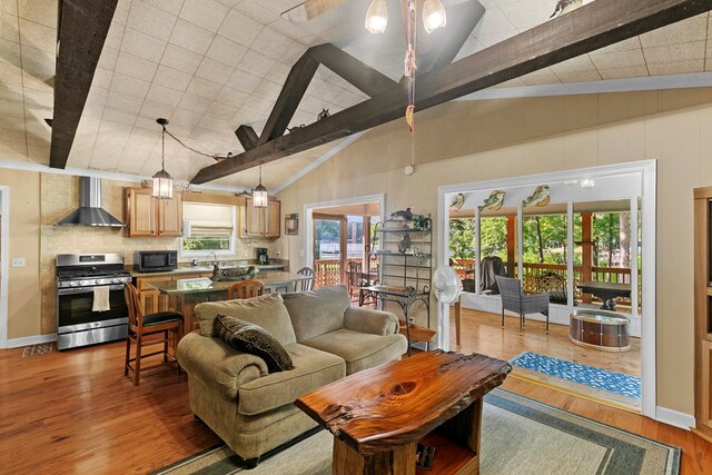 668 Lake Front Dr, Abbeville, AL 36310 - living room with wood finished floors and healthy amount of natural light