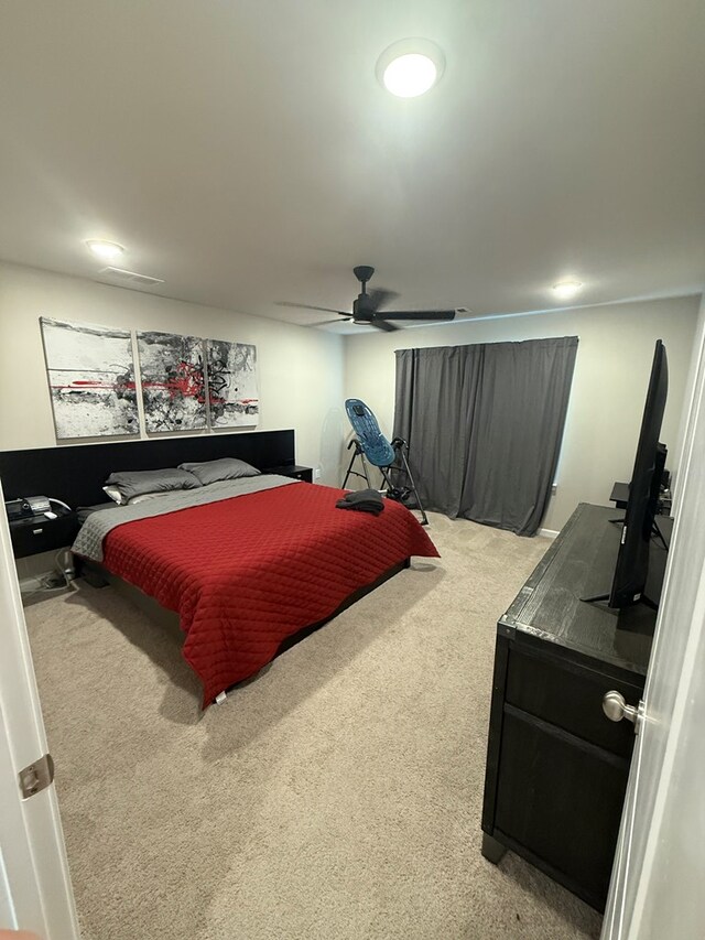 34 Popcorn Cir, Rehobeth, AL 36301 - bedroom featuring light carpet and a ceiling fan