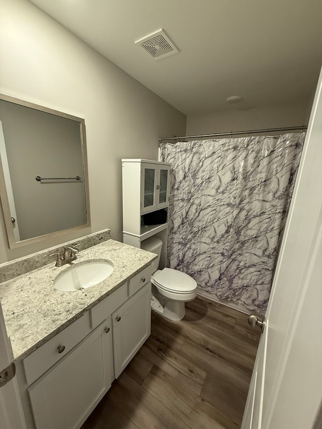 34 Popcorn Cir, Rehobeth, AL 36301 - bathroom featuring wood finished floors, vanity, and a shower with curtain