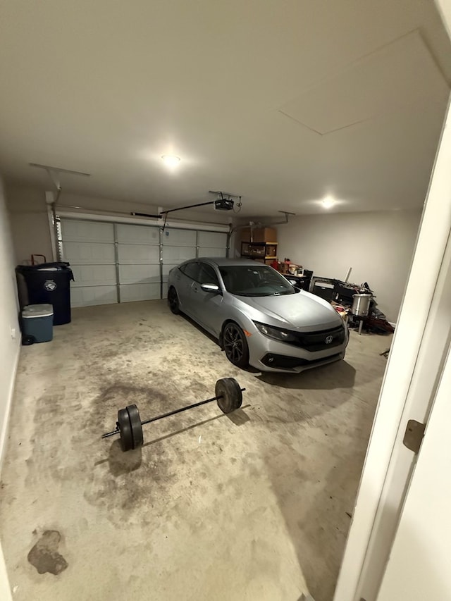 34 Popcorn Cir, Rehobeth, AL 36301 - garage featuring a garage door opener