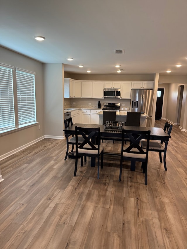 34 Popcorn Cir, Rehobeth, AL 36301 - dining room featuring wood finished floors and recessed lighting