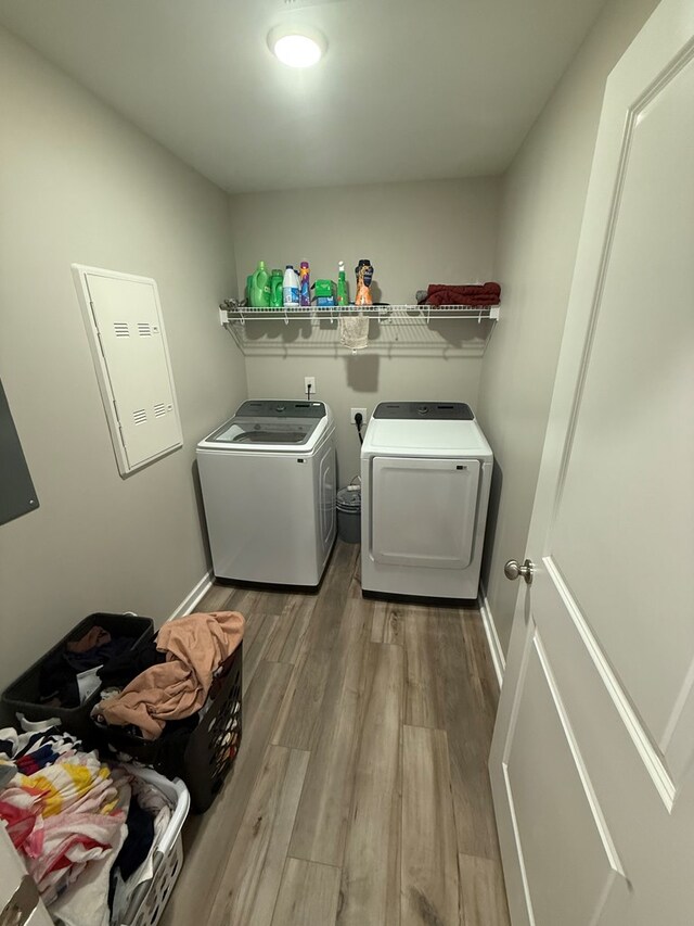 34 Popcorn Cir, Rehobeth, AL 36301 - laundry area with independent washer and dryer and wood finished floors