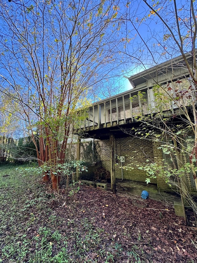 view of yard featuring a wooden deck