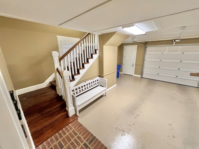 garage featuring baseboards