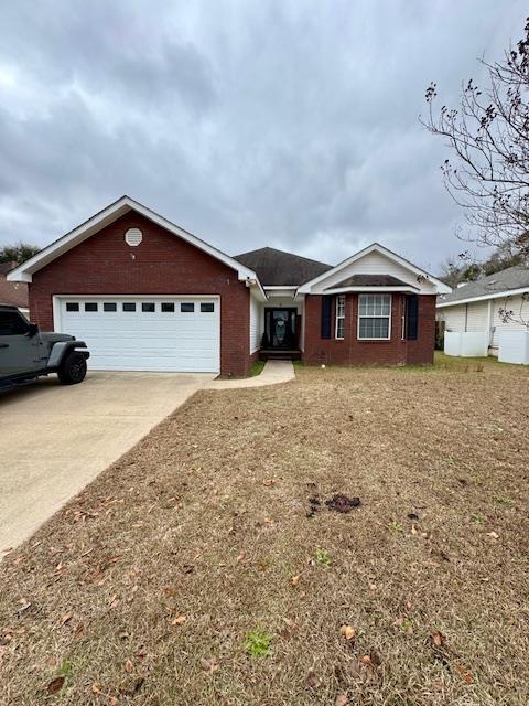 single story home with a garage