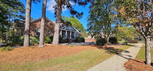 view of front of home with brick siding