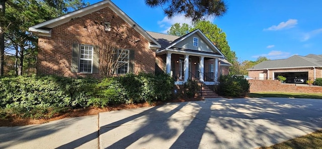 view of property featuring a porch