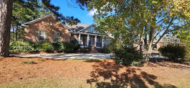 view of front of home with brick siding