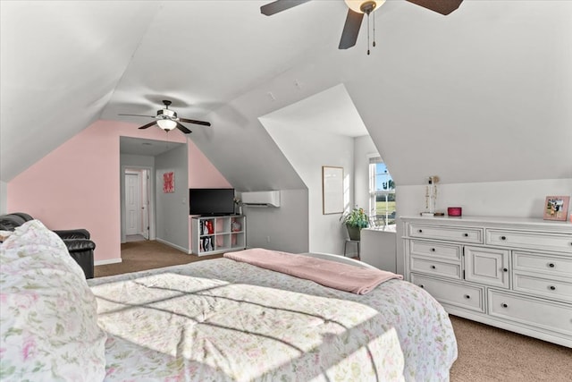 bedroom featuring light carpet, a wall unit AC, and lofted ceiling