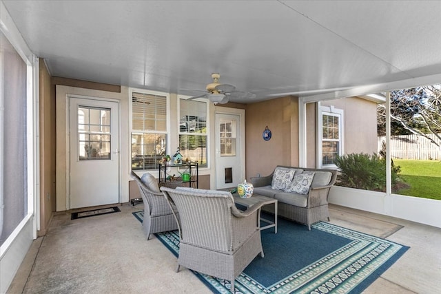 sunroom / solarium with ceiling fan