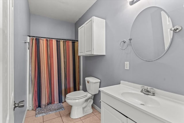 full bath featuring tile patterned flooring, toilet, a shower with shower curtain, vanity, and baseboards