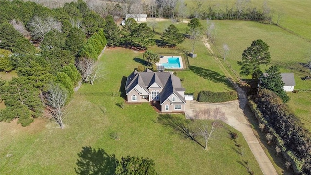 birds eye view of property featuring a rural view