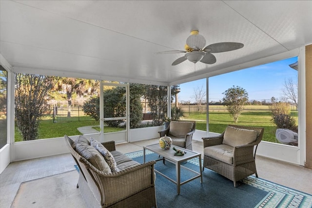 sunroom / solarium with ceiling fan