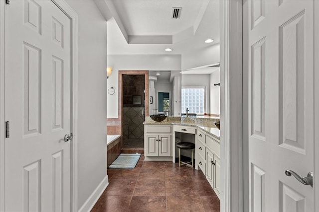 bathroom with a garden tub, recessed lighting, visible vents, vanity, and a walk in shower