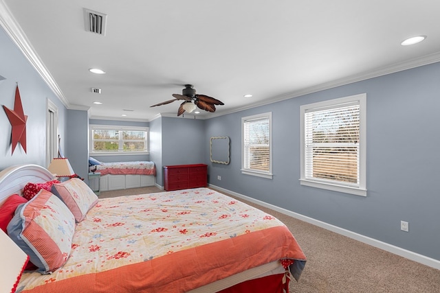 bedroom featuring multiple windows, carpet floors, ceiling fan, and crown molding