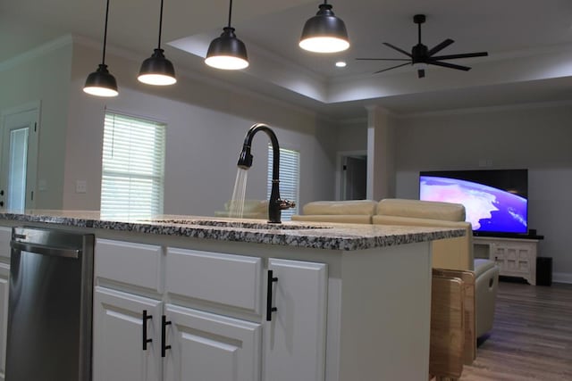 2702 Samantha Dr, Dothan, AL 36303 - kitchen with a ceiling fan, dark wood-style flooring, ornamental molding, a sink, and white cabinets