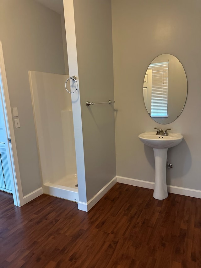 183 Chestnutt Rd, Slocomb, AL 36375 - bathroom with wood finished floors and a shower stall