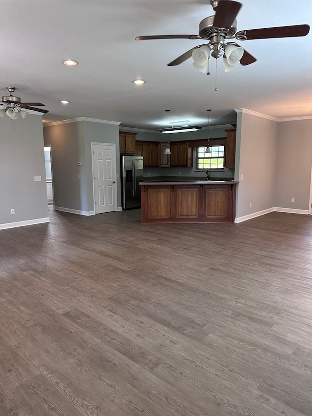 183 Chestnutt Rd, Slocomb, AL 36375 - kitchen featuring stainless steel fridge, open floor plan, crown molding, ceiling fan, and recessed lighting