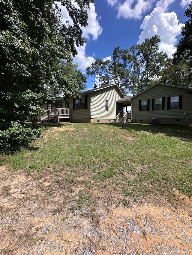 183 Chestnutt Rd, Slocomb, AL 36375 - view of grassy yard with a wooden deck