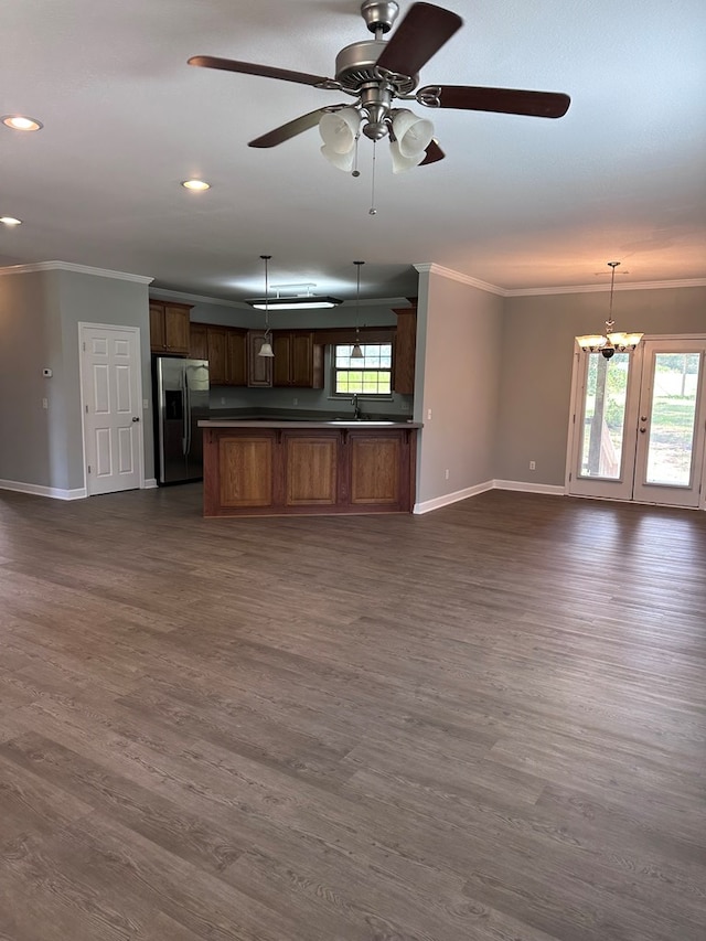 183 Chestnutt Rd, Slocomb, AL 36375 - kitchen with stainless steel refrigerator with ice dispenser, crown molding, open floor plan, dark countertops, and dark wood-style floors