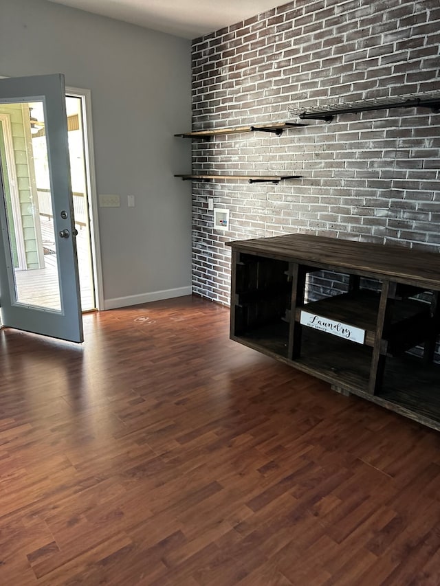 183 Chestnutt Rd, Slocomb, AL 36375 - unfurnished living room featuring dark wood-type flooring and baseboards