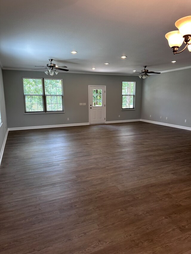 183 Chestnutt Rd, Slocomb, AL 36375 - unfurnished room featuring ceiling fan, recessed lighting, ornamental molding, dark wood-type flooring, and a chandelier