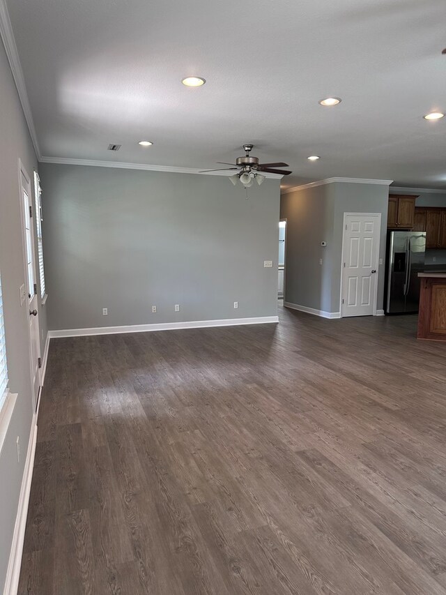 183 Chestnutt Rd, Slocomb, AL 36375 - unfurnished living room with ornamental molding, recessed lighting, ceiling fan, and dark wood-style floors