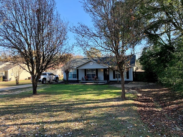 ranch-style house with a front yard