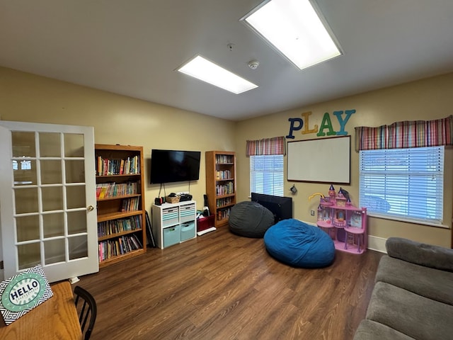 game room with wood finished floors