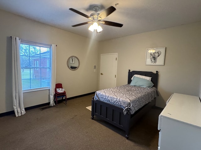 bedroom with carpet flooring, ceiling fan, and baseboards