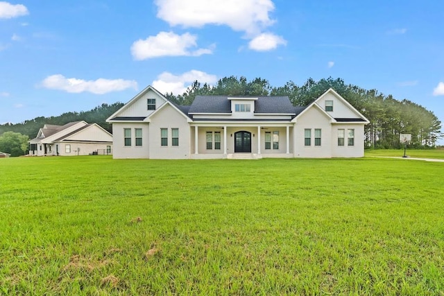5700 S State Highway 605, Rehobeth, AL 36301 - back of property with a yard and a porch
