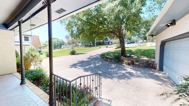 view of patio featuring a garage