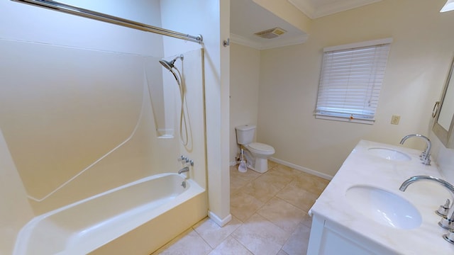 full bathroom with tile patterned floors, vanity, crown molding, shower / tub combination, and toilet