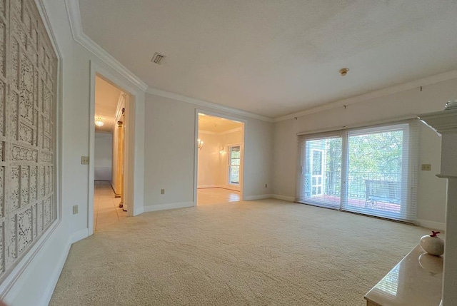 interior space with light colored carpet and crown molding