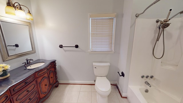 full bathroom featuring toilet, vanity, tile patterned floors, and shower / bathtub combination