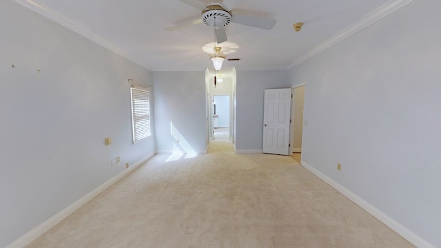 unfurnished room featuring light carpet, ceiling fan, and ornamental molding