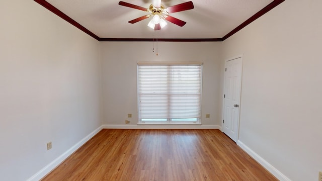 unfurnished room with a textured ceiling, ceiling fan, light wood-type flooring, and ornamental molding