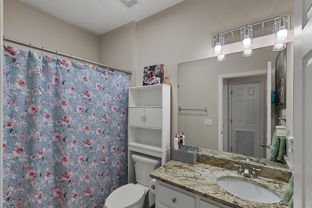 106 Lake Ln, Headland, AL 36345 - bathroom with vanity, toilet, and a shower with curtain