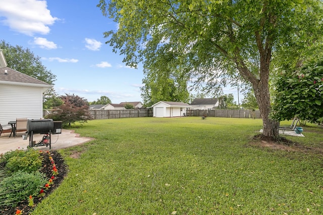 106 Lake Ln, Headland, AL 36345 - view of yard with a patio, a shed, and an outbuilding