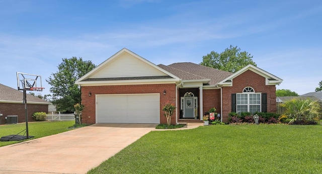 106 Lake Ln, Headland, AL 36345 - view of front of property with driveway, an attached garage, brick siding, roof with shingles, and central air condition unit